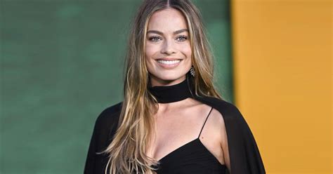 margot robie bikini|Margot Robbie stuns in black bikini as she joins。